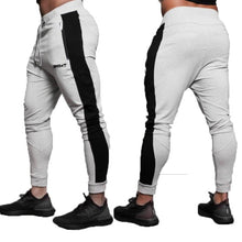 Load image into Gallery viewer, Men's High quality Brand Men pants Fitness Casual Elastic Pants bodybuilding clothing casual camouflage sweatpants joggers pants