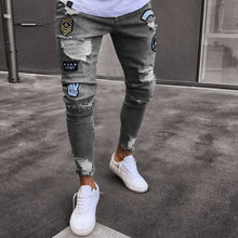Load image into Gallery viewer, European and American small foot badge jeans men&#39;s fashion knee hole zipper small foot hole denim trousers
