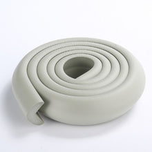 Load image into Gallery viewer, LOVYNO 1PC 2M Baby Safety Table Desk Edge Guard Strip Home Cushion Guard Strip Safe Protection Children Bar Strip Soft Thicken
